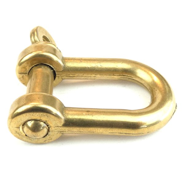 Brass shackle with straight bows. For fastening and joining.
